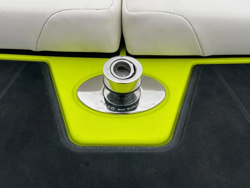 Slide: The Image of Axis T220 boat seat with a metallic fixture, 2023 model. - 39