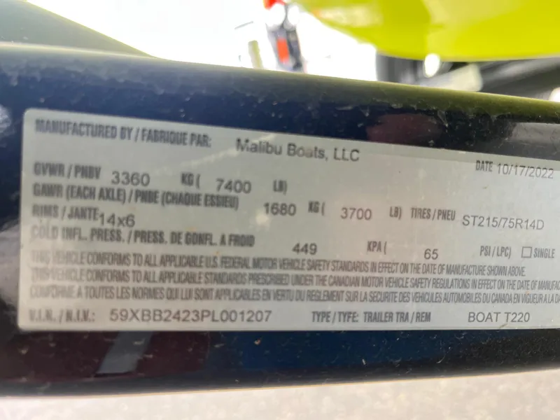 Slide: The Image of Label on Axis T220 trailer by Malibu Boats, showing specifications and compliance details. - 41