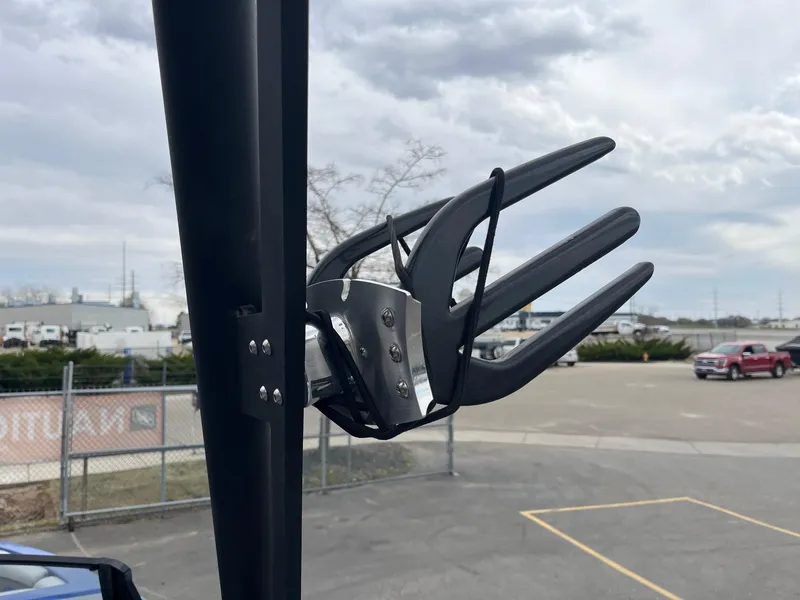 Slide: The Image of 2023 Axis T220 wakeboard rack against cloudy sky in parking lot. - 33