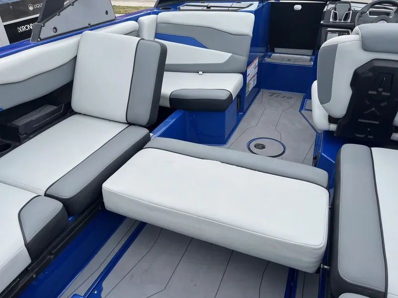 Slide: The Image of 2023 Axis T220 boat interior with gray and blue seating arrangement. - 36