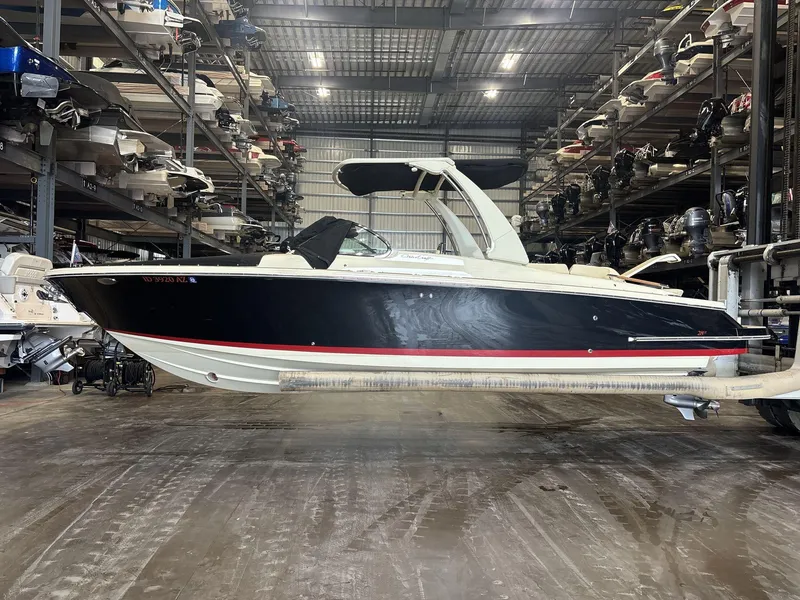 Slide: The Image of 2019 Chris-Craft Launch 28 GT boat in storage facility. - 1