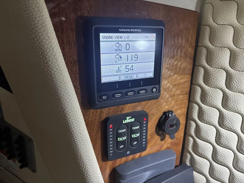 Slide: The Image of Dashboard of 2019 Chris-Craft Launch 28 GT with Volvo Penta display and controls. - 15
