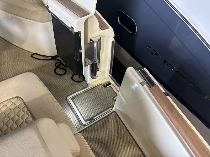 Slide: The Image of Interior of 2019 Chris-Craft Launch 28 GT boat, featuring elegant seating and flooring. - 18
