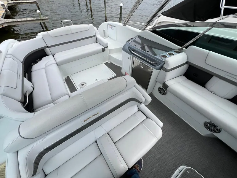Slide: The Image of 2015 Formula 350 Crossover Bowrider interior with luxurious seating and modern dashboard. - 11
