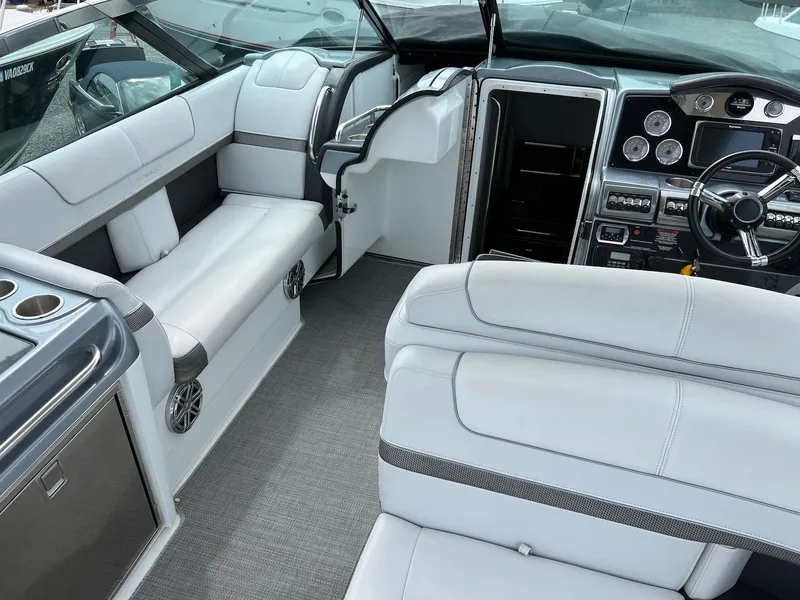 Slide: The Image of 2015 Formula 350 Crossover Bowrider interior with luxurious seating and modern dashboard. - 14