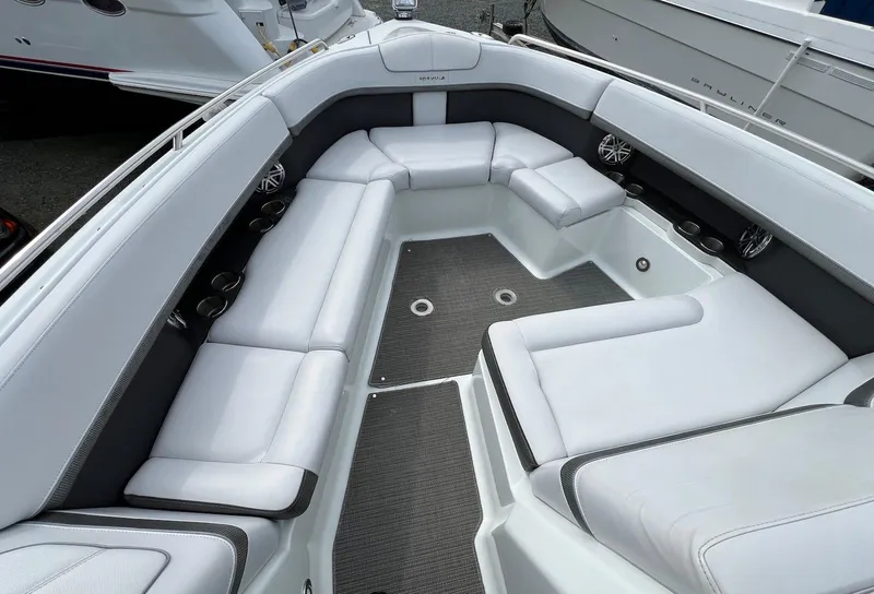 Slide: The Image of 2015 Formula 350 Crossover Bowrider with spacious white seating and modern design. - 17