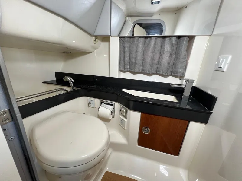 Slide: The Image of 2015 Formula 350 Crossover Bowrider bathroom with modern fixtures and compact design. - 30