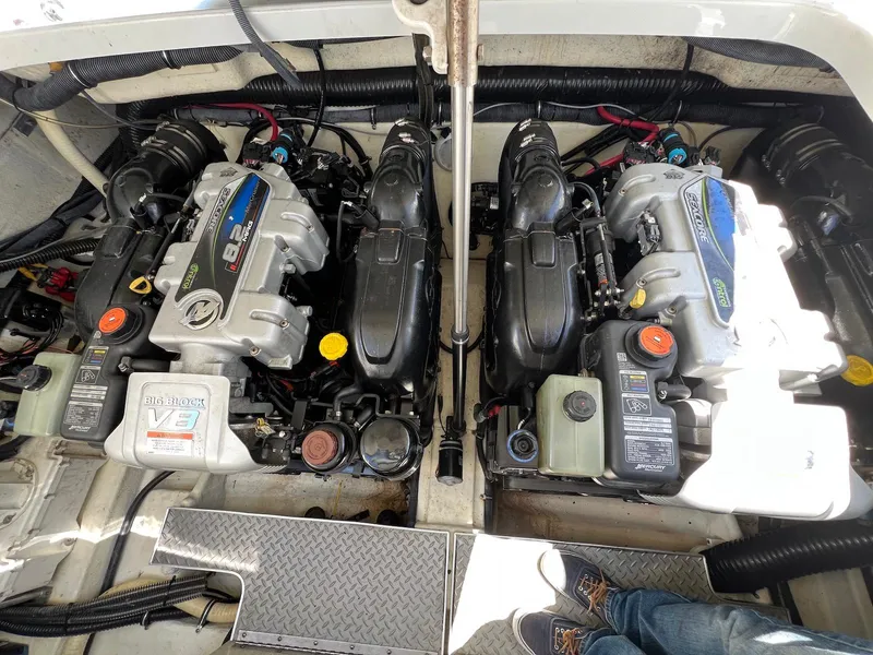 Slide: The Image of Engine compartment of a 2015 Formula 350 Crossover Bowrider, featuring dual powerful engines. - 31