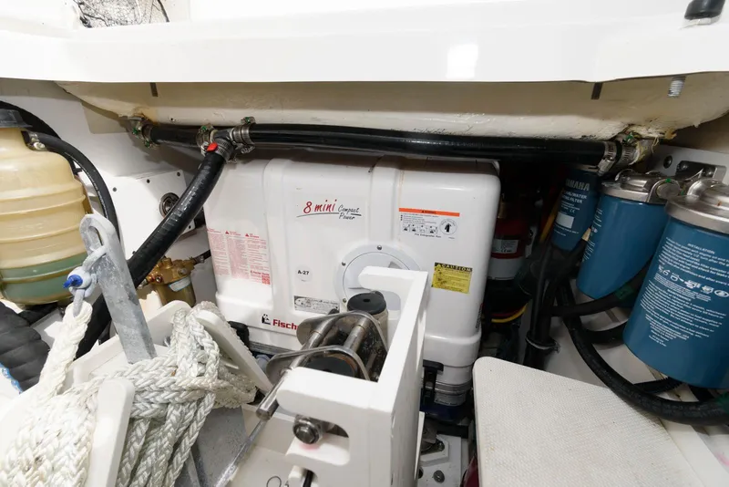 Slide: The Image of Engine compartment of 2022 Pursuit S 378 Sport boat with Fischer Panda generator. - 28