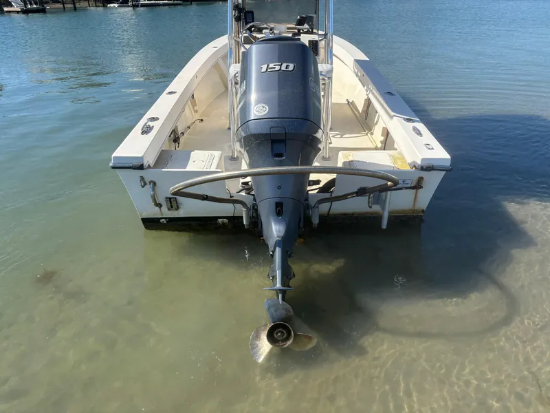 Slide: The Image of 2005 Jones Brothers 18 Cape Fisherman boat with 150 HP engine in shallow water. - 17