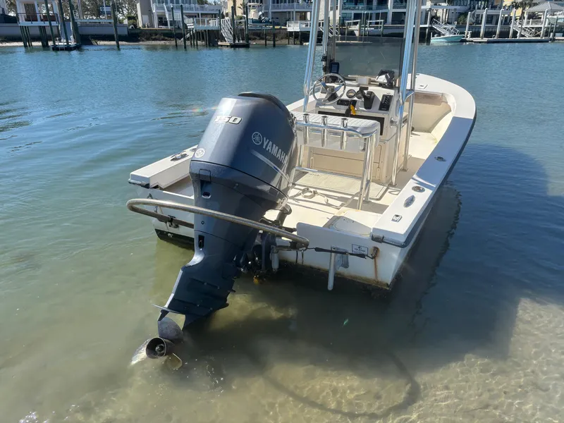 Slide: The Image of 2005 Jones Brothers 18 Cape Fisherman boat with Yamaha outboard motor in shallow water. - 18