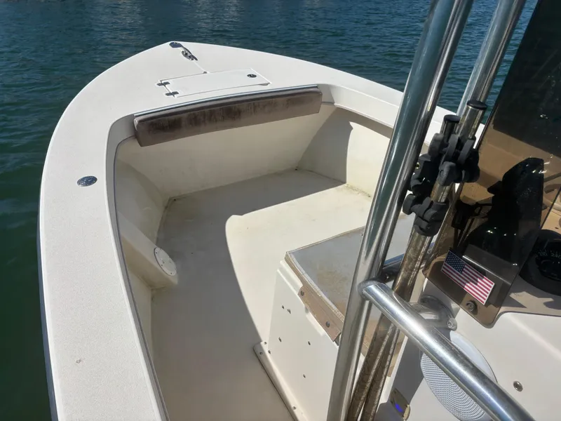 Slide: The Image of 2005 Jones Brothers 18 Cape Fisherman boat interior on water. - 7