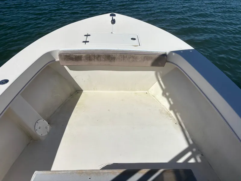 Slide: The Image of 2005 Jones Brothers 18 Cape Fisherman boat interior with open deck and water view. - 8