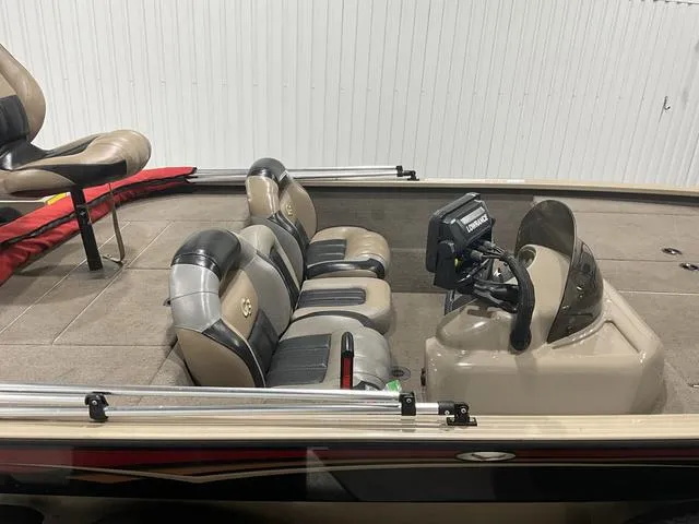 Slide: The Image of 2011 G3 170 boat interior with seating and control console. - 9