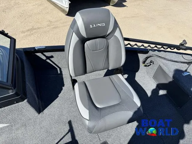 Slide: The Image of 2023 Lund 1675 Adventure Sport boat seat, gray and black, on carpeted deck. - 15