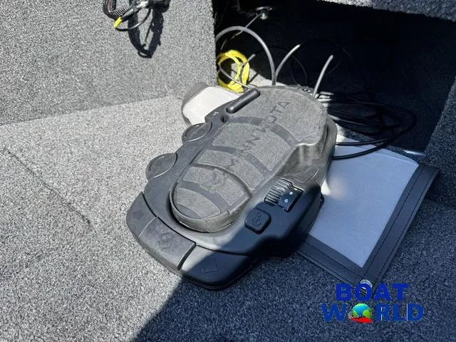 Slide: The Image of 2023 Lund 1675 Adventure Sport boat interior with foot pedal control. - 17