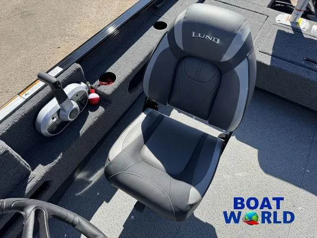 Slide: The Image of 2023 Lund 1675 Adventure Sport boat seat and controls, featuring Boat World logo. - 22
