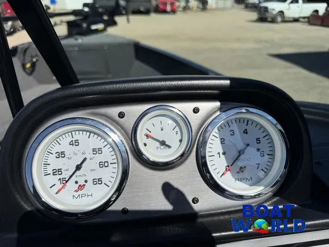 Slide: The Image of Dashboard of 2023 Lund 1675 Adventure Sport boat with speedometer, fuel, and RPM gauges. - 23