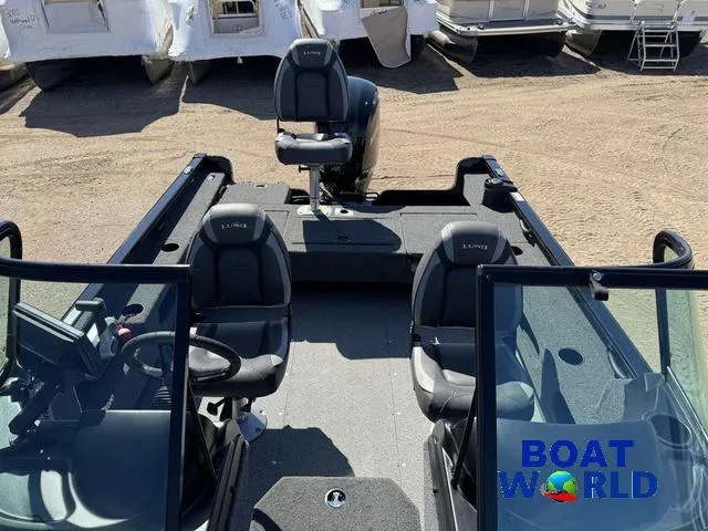 Slide: The Image of 2023 Lund 1675 Adventure Sport boat interior with seating, displayed at Boat World. - 33