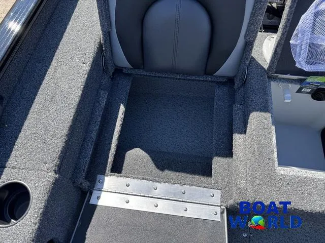 Slide: The Image of 2023 Lund 1675 Adventure Sport boat interior with gray seating and carpeted flooring. - 36