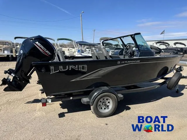 Slide: The Image of 2023 Lund 1675 Adventure Sport boat on trailer at Boat World dealership. - 38