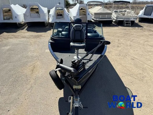 Slide: The Image of 2023 Lund 1675 Adventure Sport boat on display at a dealership. - 4