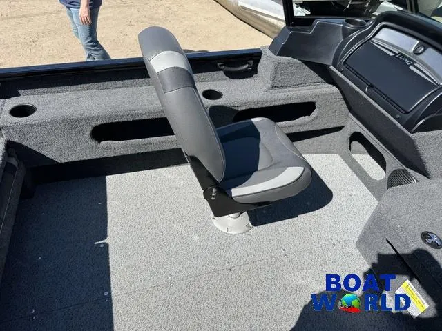 Slide: The Image of 2023 Lund 1675 Adventure Sport boat interior with gray seating and carpeted flooring. - 40