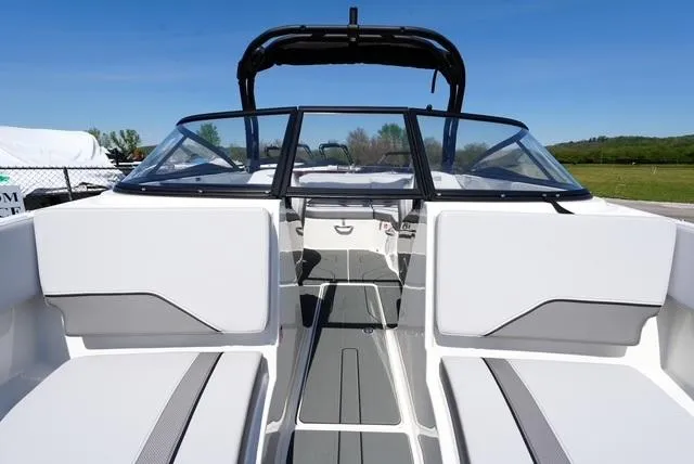 Slide: The Image of 2025 Bayliner V20i boat interior with sleek seating and modern design. - 13