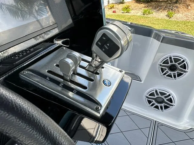 Slide: The Image of 2024 Nor-Tech 390 Sport boat controls with sleek design and modern features. - 9