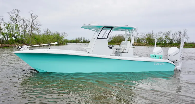 Slide: The Image of 2022 Costa Custom Boats 264 HC in turquoise on calm water. - 0