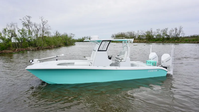 Slide: The Image of 2022 Costa Custom Boats 264 HC on calm water, showcasing sleek design and modern features. - 1