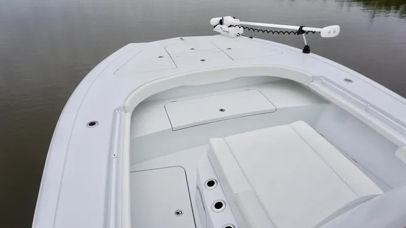 Slide: The Image of 2022 Costa Custom Boats 264 HC bow with sleek design and storage compartments. - 27