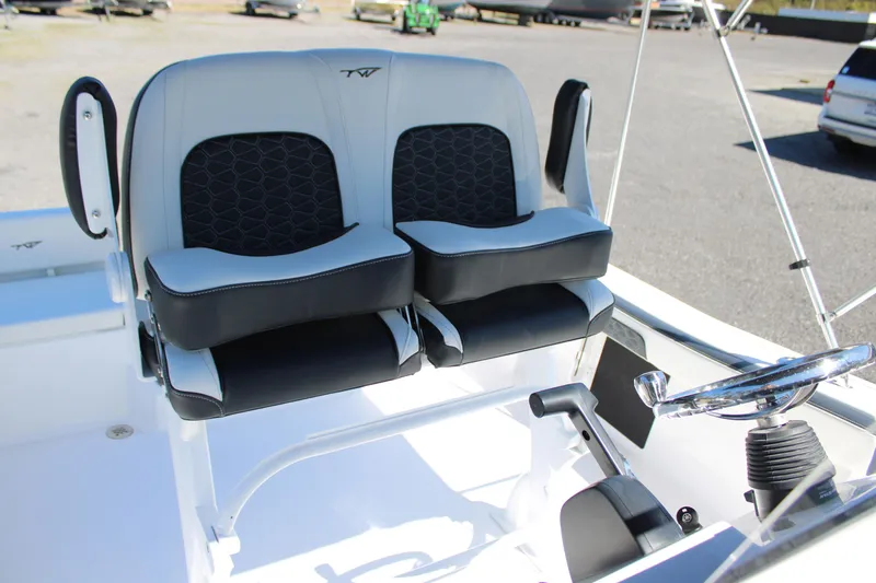 Slide: The Image of 2025 Tidewater 198 CC Adventure boat seats and steering wheel, showcasing modern design and comfort. - 12