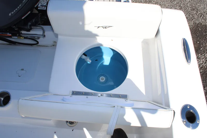 Slide: The Image of 2025 Tidewater 198 CC Adventure boat with livewell and seating area. - 18