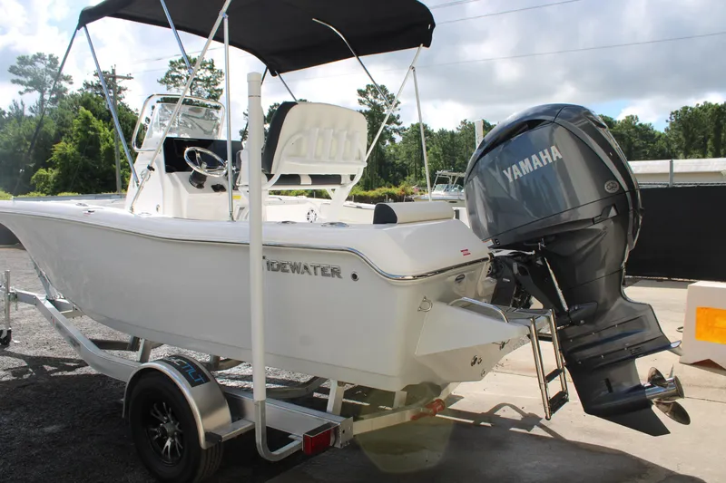 Slide: The Image of 2025 Tidewater 198 CC Adventure boat with Yamaha engine on trailer. - 28