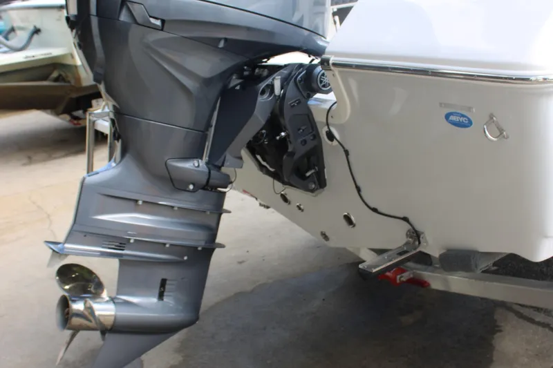Slide: The Image of 2025 Tidewater 198 CC Adventure boat's outboard motor and stern view. - 30