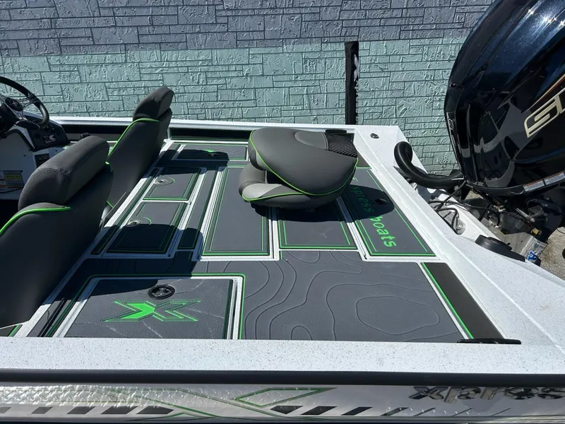 Slide: The Image of 2025 Xpress X19 Pro boat interior with sleek seating and modern design. - 5