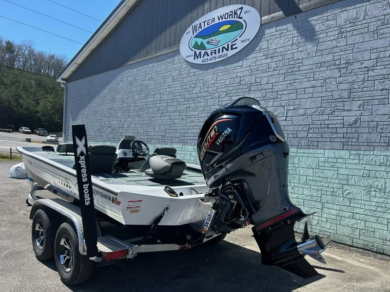 Slide: The Image of 2025 Xpress X19 Pro boat on trailer at Water Workz Marine. - 6