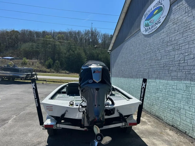 Slide: The Image of 2025 Xpress X19 Pro boat at Water Works Marine dealership, rear view. - 7