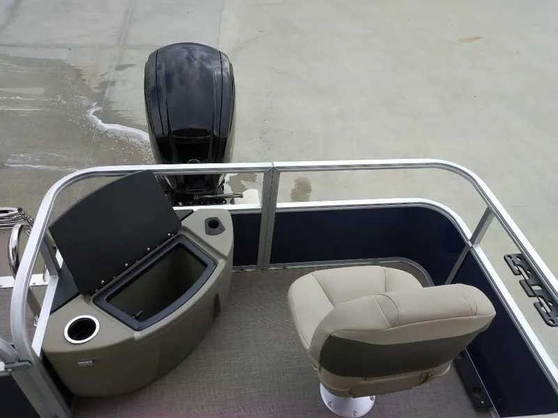 Slide: The Image of 2025 Sun Tracker Bass Buggy 18 DLX pontoon boat with seating and motor. - 7