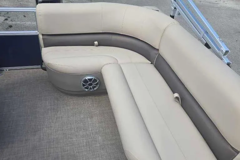 Slide: The Image of 2025 Sun Tracker Bass Buggy 16 XL Select boat seating, beige and brown upholstery. - 7