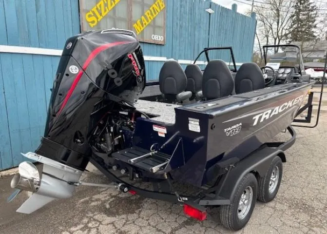 Slide: The Image of 2025 Tracker Targa V-18 Combo boat with powerful outboard motor on trailer. - 2