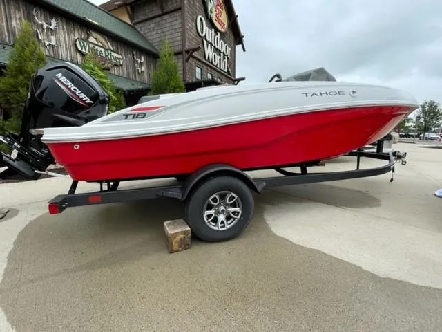 The Image of 2025 Tahoe T18 boat in red and white on a trailer at Outdoor World. - 0