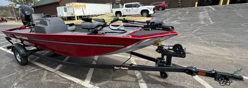 Slide: The Image of 2025 Tracker Bass Tracker Classic XL boat on trailer in parking lot. - 3
