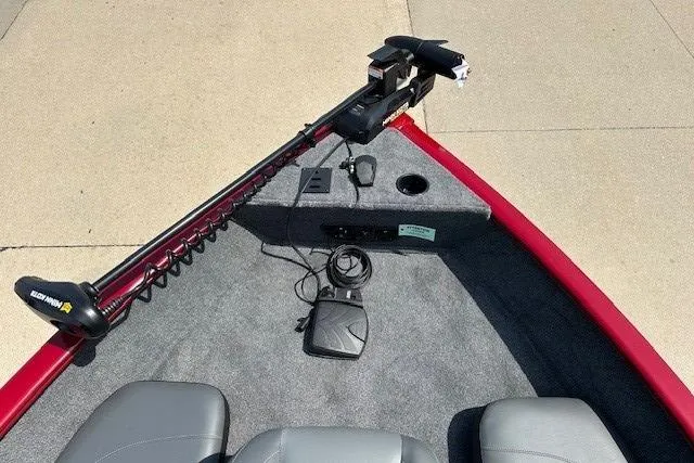 Slide: The Image of 2025 Tracker Pro Guide V-175 Combo boat interior with trolling motor and seating. - 3