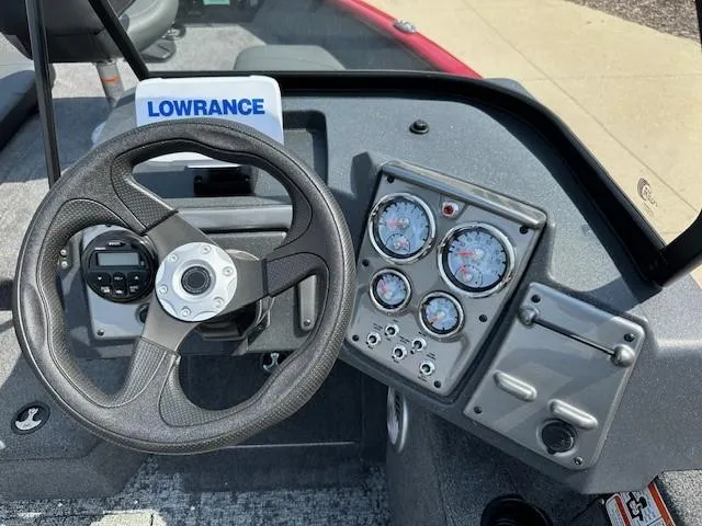 Slide: The Image of 2025 Tracker Pro Guide V-175 Combo dashboard with steering wheel and instrument panel. - 7