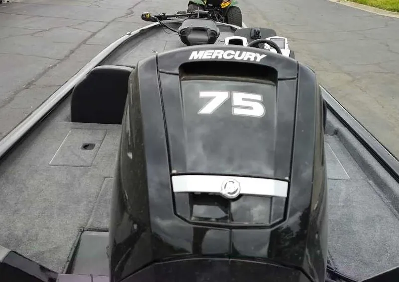 Slide: The Image of 2025 Tracker Pro Team 175 Crappie Edition with Mercury 75 engine on a paved surface. - 4