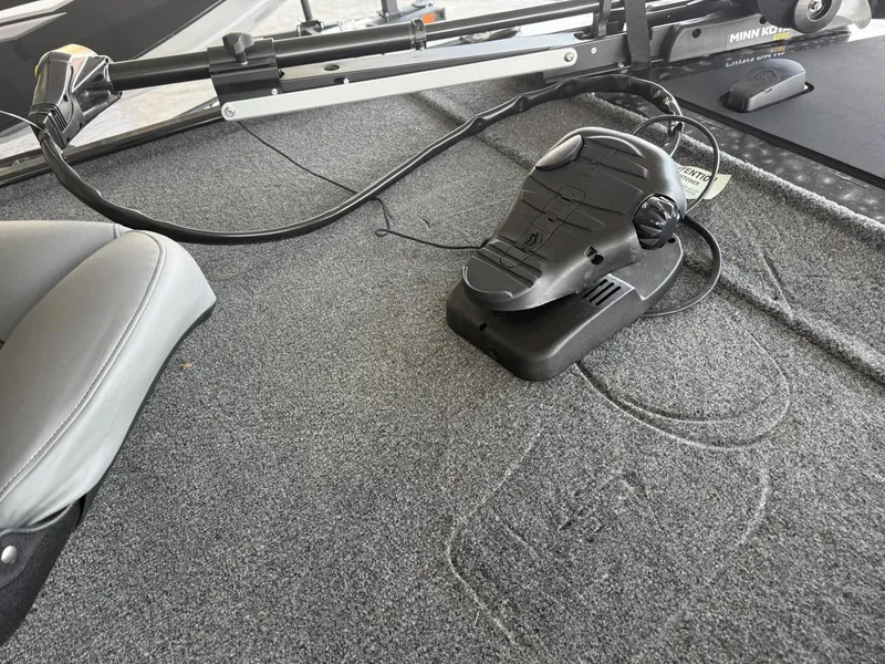 Slide: The Image of 2025 Tracker Bass Tracker Classic XL boat interior with trolling motor and seat. - 10