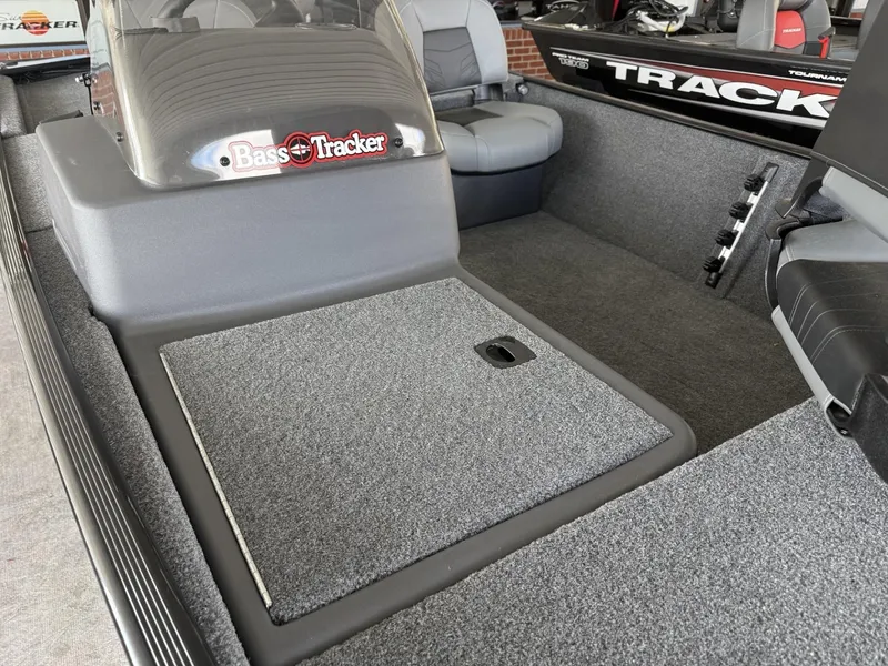 Slide: The Image of 2025 Tracker Bass Tracker Classic XL boat interior with seating and storage. - 11