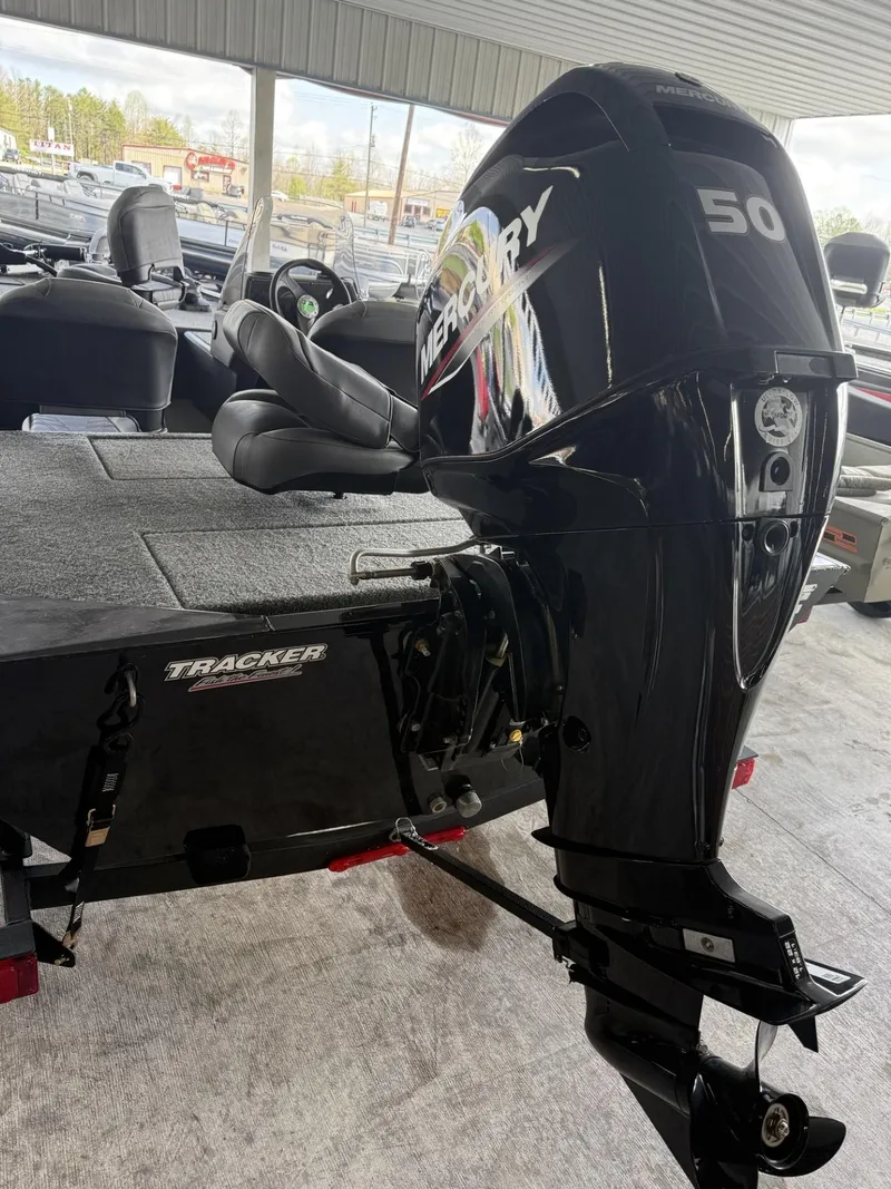 Slide: The Image of 2025 Tracker Bass Tracker Classic XL with Mercury 50 outboard motor in showroom. - 3